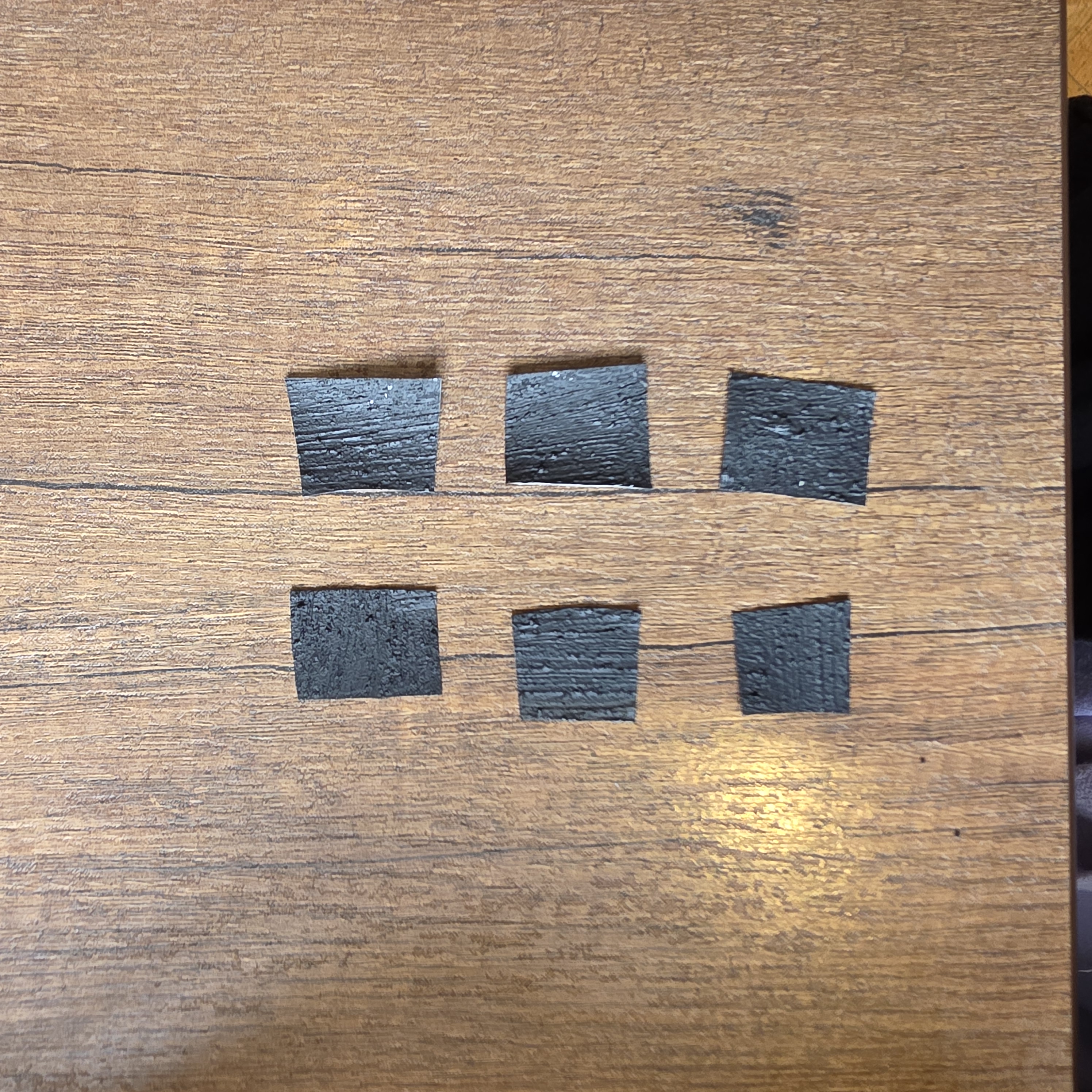cutting out conducted paint into six sections as exploring my project in using braille